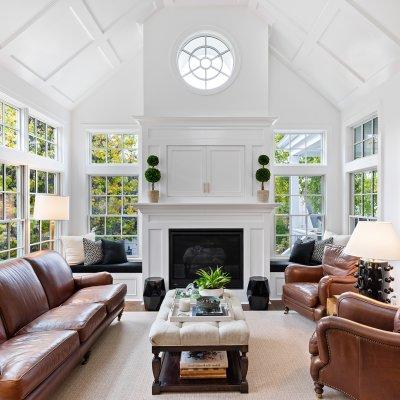 addition vaulted tray ceiling fireplace round window